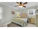 Serene bedroom featuring a tufted headboard, soft bedding, and modern side table at 305 Driver Ave, Summerville, SC 29483
