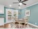 Dining room with a wood table, chairs, and view to the sunroom at 305 Driver Ave, Summerville, SC 29483
