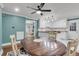 Dining room with a wood table, chairs, and view to the kitchen at 305 Driver Ave, Summerville, SC 29483