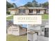 Charming remodeled single-story home with brick accents, new kitchen and detached garage at 305 Driver Ave, Summerville, SC 29483