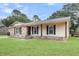 Attractive single-story home featuring a brick foundation and a well-maintained lawn at 305 Driver Ave, Summerville, SC 29483