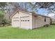 Spacious detached two-car garage with painted siding and ample parking space at 305 Driver Ave, Summerville, SC 29483