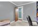 Home office featuring neutral paint, white trim, and wood door to the hallway at 305 Driver Ave, Summerville, SC 29483