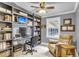 Comfortable home office with custom built-ins, neutral paint, ceiling fan, and large window at 305 Driver Ave, Summerville, SC 29483