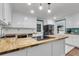 Bright kitchen featuring white cabinets, butcher block countertops, and new appliances at 305 Driver Ave, Summerville, SC 29483