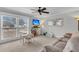 Inviting living room with a plush sofa, TV, and lots of natural light at 305 Driver Ave, Summerville, SC 29483