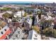 Aerial view of the neighborhood with colorful Charleston-style homes near the water at 31 Hasell St, Charleston, SC 29401