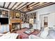 Bright and well decorated living room with a desk area and custom bookshelves at 31 Hasell St, Charleston, SC 29401
