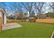 Spacious backyard featuring a deck, storage shed, newly installed fence and lush green lawn at 312 Mary Scott Dr, Goose Creek, SC 29445