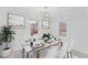A styled dining room features art and decor to create an inviting space at 312 Mary Scott Dr, Goose Creek, SC 29445
