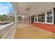 Inviting front porch with ceiling fan and ample space for outdoor seating at 312 Mary Scott Dr, Goose Creek, SC 29445
