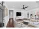 Beautifully decorated living room leading to dining area, with modern furniture and finishes at 312 Mary Scott Dr, Goose Creek, SC 29445