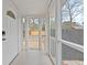 Enclosed porch features an exterior view into the yard at 312 Mary Scott Dr, Goose Creek, SC 29445