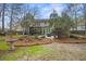 Beautiful backyard showcasing a stone patio and scenic landscaping at 3216 Rose Walk Ct, Mount Pleasant, SC 29466