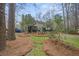 Secluded backyard featuring mature trees and a lush green lawn at 3216 Rose Walk Ct, Mount Pleasant, SC 29466