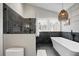 Stunning bathroom with modern fixtures and a separate glass-enclosed shower and luxurious tub at 3216 Rose Walk Ct, Mount Pleasant, SC 29466