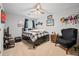 Comfortable bedroom with ceiling fan, neutral walls, and decorative furnishings at 3216 Rose Walk Ct, Mount Pleasant, SC 29466