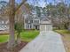 Charming two-story home with a well-manicured lawn and a two-car garage at 3216 Rose Walk Ct, Mount Pleasant, SC 29466