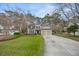 Charming two-story home with a well-manicured lawn and a two-car garage at 3216 Rose Walk Ct, Mount Pleasant, SC 29466