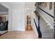 Open foyer with tile flooring and stairs leading to the upper level at 3216 Rose Walk Ct, Mount Pleasant, SC 29466