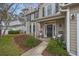 Charming home with a cozy front porch and neat landscaping at 3216 Rose Walk Ct, Mount Pleasant, SC 29466