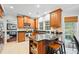 Well-lit kitchen featuring custom cabinetry, granite countertops, and stainless steel appliances at 3216 Rose Walk Ct, Mount Pleasant, SC 29466