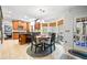 Eat-in kitchen area with round table, wood cabinets, and natural light at 3216 Rose Walk Ct, Mount Pleasant, SC 29466
