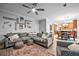 Living room showcasing spacious layout, comfortable seating, and view into the kitchen at 3216 Rose Walk Ct, Mount Pleasant, SC 29466