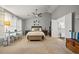 Spacious main bedroom with vaulted ceiling, ceiling fan, ensuite bath access, and natural light at 3216 Rose Walk Ct, Mount Pleasant, SC 29466