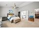 Spacious main bedroom with vaulted ceiling, ceiling fan, ensuite bath access, and carpet floors at 3216 Rose Walk Ct, Mount Pleasant, SC 29466