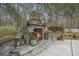 Outdoor fireplace with seating area perfect for entertaining or relaxing outside at 3216 Rose Walk Ct, Mount Pleasant, SC 29466