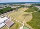 Wide aerial view showcasing the community's sports fields, ponds, and residential neighborhoods at 323 Waterlily Way, Summerville, SC 29486