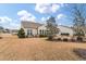 Lovely backyard with a well-maintained lawn and patio area at 323 Waterlily Way, Summerville, SC 29486