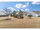 Spacious backyard providing ample room for outdoor activities at 323 Waterlily Way, Summerville, SC 29486