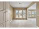 Cozy breakfast nook with natural light streaming in from the large windows, perfect for morning coffee at 323 Waterlily Way, Summerville, SC 29486