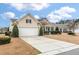 Beautiful home featuring a well-maintained lawn and a spacious driveway at 323 Waterlily Way, Summerville, SC 29486