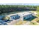 Aerial of Whitesville Rural Fire Department: Modern facility with apparatus bays and parking amidst wooded surroundings at 323 Waterlily Way, Summerville, SC 29486