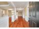 Spacious foyer with hardwood floors leading to the rest of the home at 323 Waterlily Way, Summerville, SC 29486