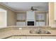 Kitchen view featuring granite countertops and stainless steel sink at 323 Waterlily Way, Summerville, SC 29486