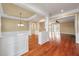 Spacious living room with hardwood floors, neutral walls, and decorative columns for an open feel at 323 Waterlily Way, Summerville, SC 29486