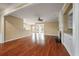 A living room features hardwood floors, fireplace, and open floor plan at 323 Waterlily Way, Summerville, SC 29486