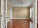 View of office space featuring hardwood floors and shuttered windows at 323 Waterlily Way, Summerville, SC 29486