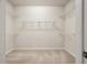 Spacious walk-in closet with carpet and wire shelving ready to be filled at 323 Waterlily Way, Summerville, SC 29486
