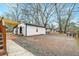 A detached garage in backyard with a covered area to the side and lots of space at 3351 Londonderry Rd, North Charleston, SC 29420