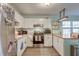 Bright kitchen featuring white cabinets, stainless steel appliances, and butcher block countertops at 3351 Londonderry Rd, North Charleston, SC 29420