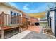 Brick patio with a wooden deck and awning creating an inviting outdoor living space with BBQ at 3351 Londonderry Rd, North Charleston, SC 29420