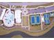 Beautiful aerial view of community pool, clubhouse, tennis courts and ample parking at 352 Great Lawn Dr, Summerville, SC 29486