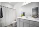Clean bathroom with a white vanity, a large mirror, and a shower-tub combination at 352 Great Lawn Dr, Summerville, SC 29486