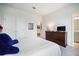 Bright bedroom featuring a large closet and a wooden dresser with television at 352 Great Lawn Dr, Summerville, SC 29486