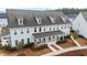 Townhome complex featuring a covered porch with rocking chairs at 352 Great Lawn Dr, Summerville, SC 29486